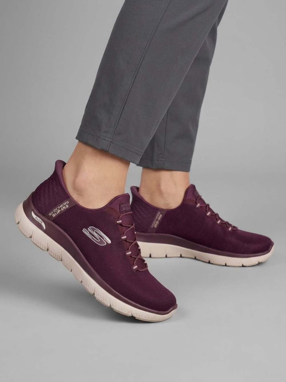 Skechers Women's Slip-On Athletic Sneakers in Plum with Light Pink Sole